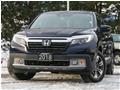 2018
Honda
Ridgeline Touring - Sunroof / Navigation . Backup Camera / D